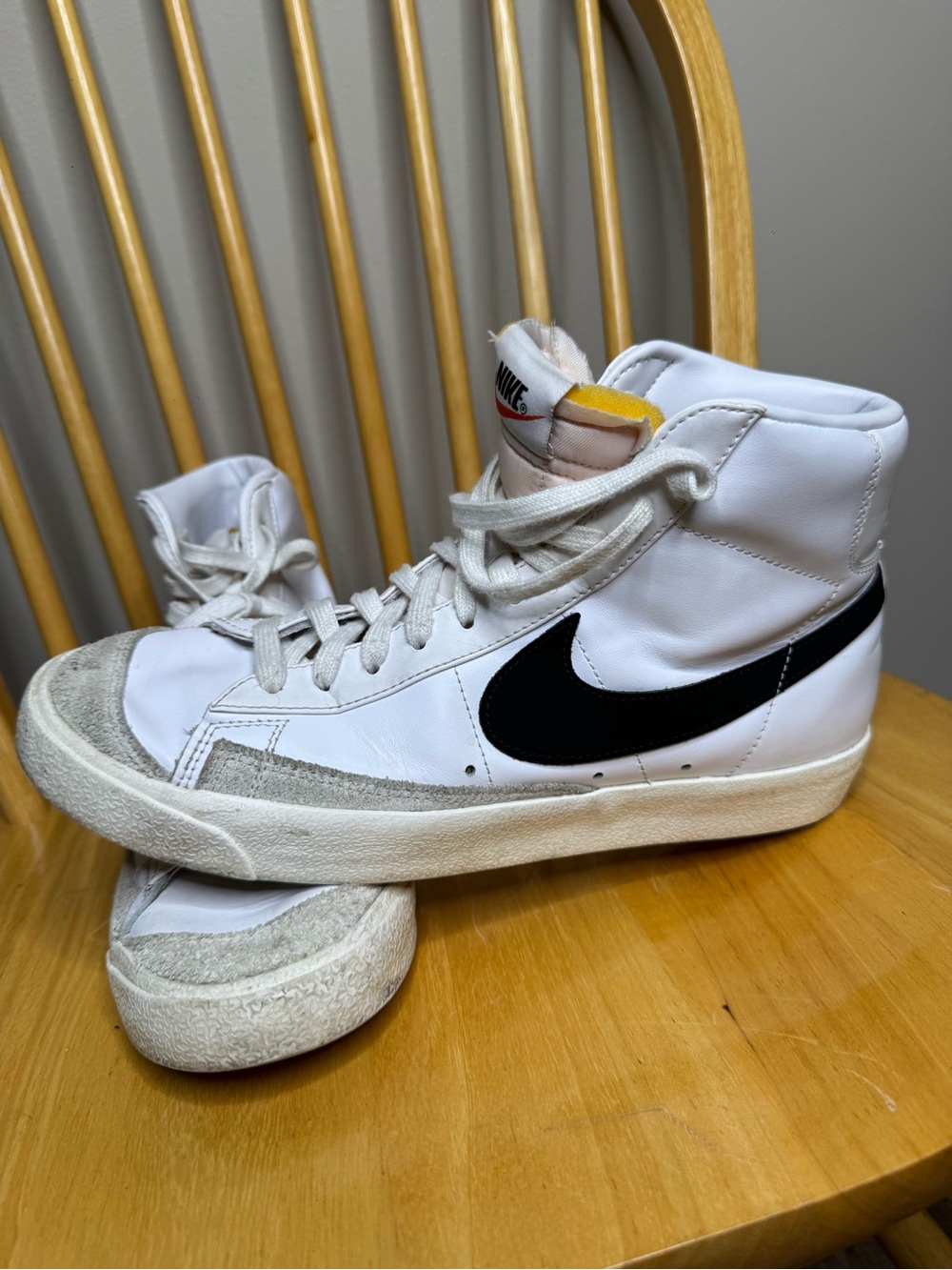 Nike White High-Top Sneakers with Black Swoosh and Gray Suede